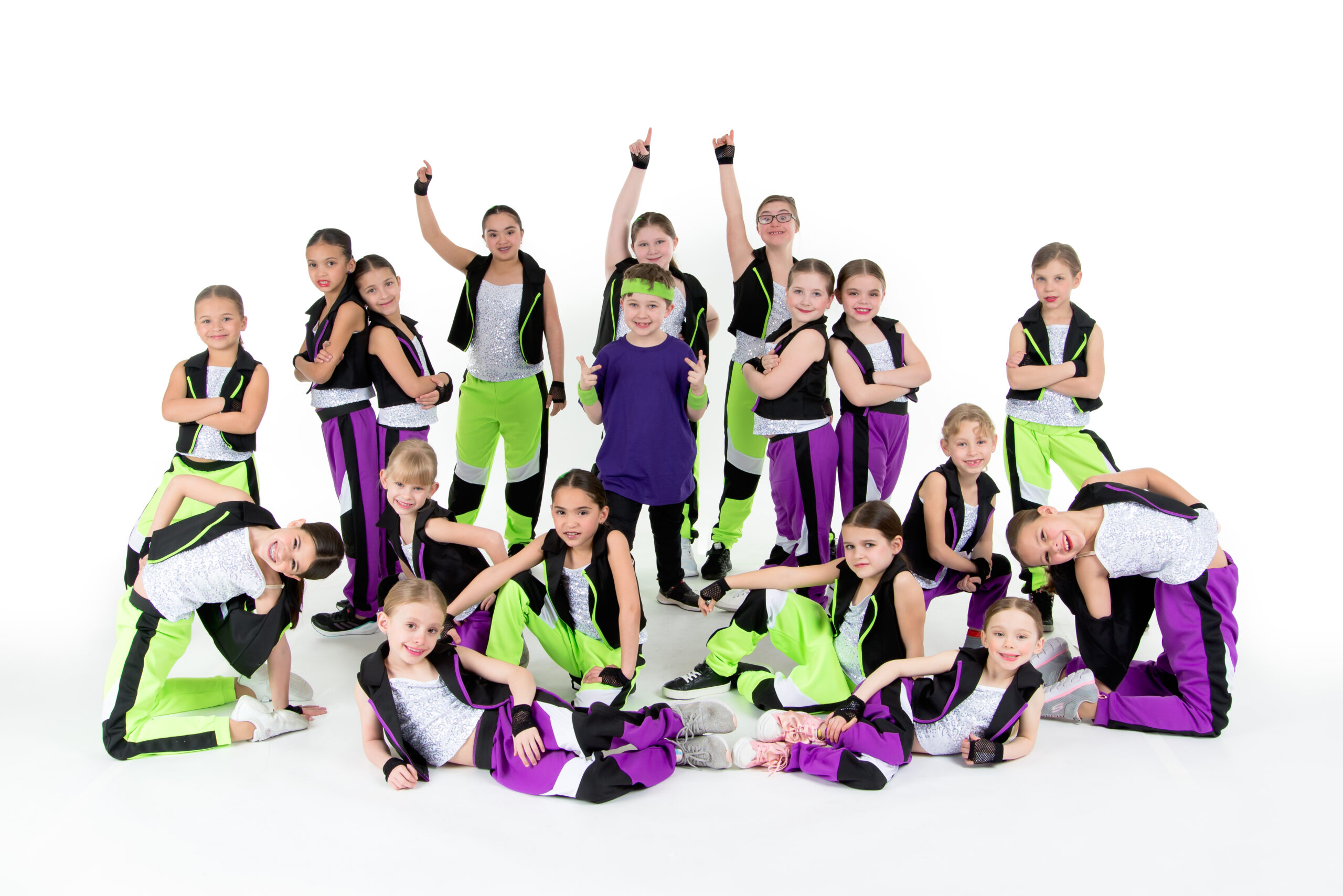 Our petite hip hop dancers posed in green and purple.