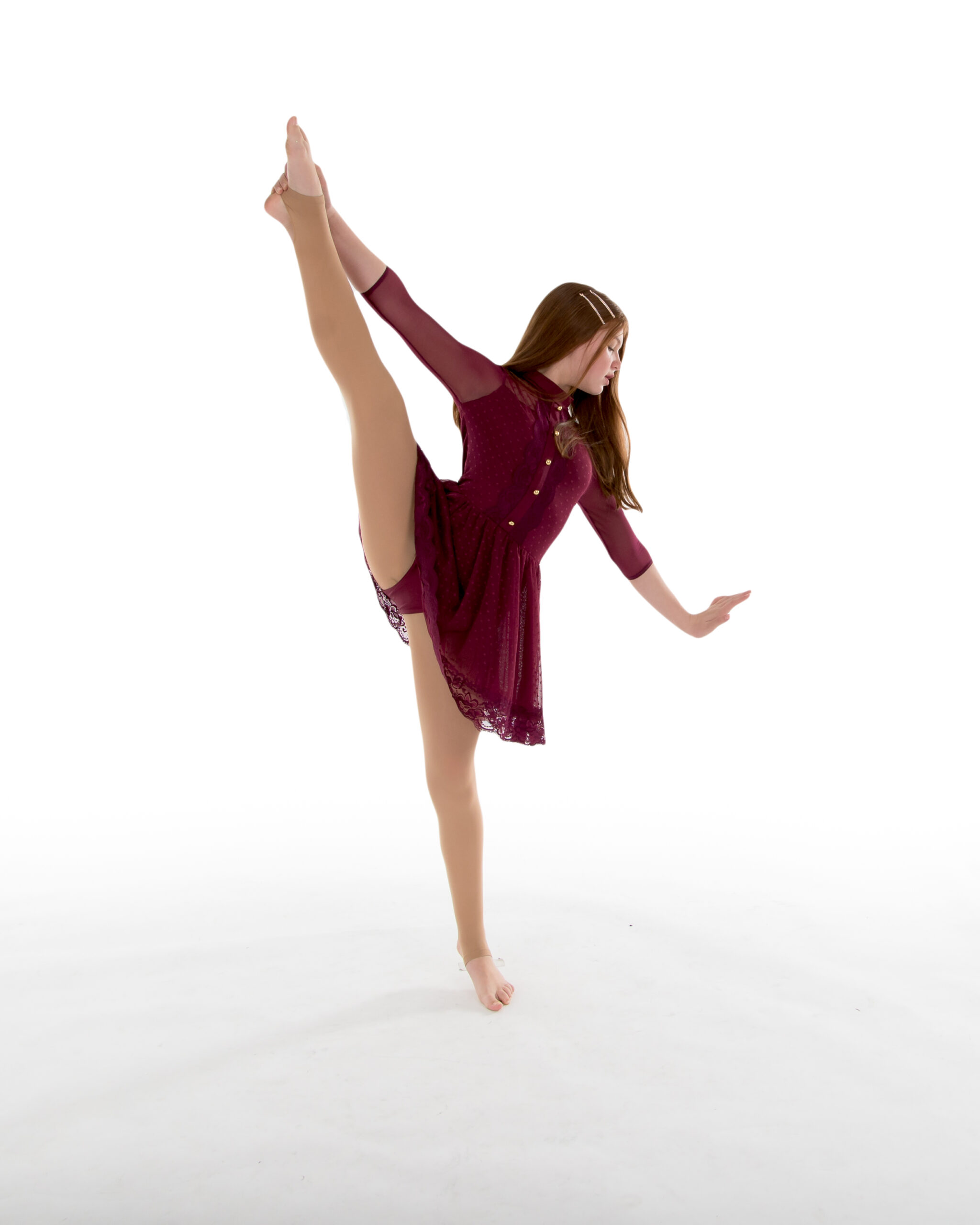 One of our Contemporary 3C+4 dancers in a leg stretch.